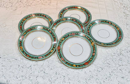 A set of 6 Antique Tea/Side Plates.  Made in England.  White base colour decorated with a turquoise banding and a garland of painted fruit.  Gold filigree detail and rims.  Minimal age and use, good overall condition.  No damages.  Stamped on the base pattern number 1735.  Diameter approx 7". 