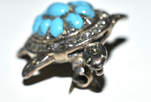 Broche vintage de tortuga de marcasita y piedra azul