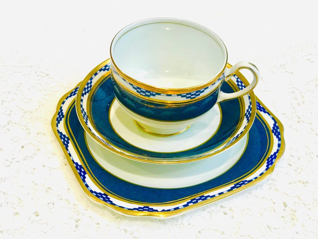 A bold coloured Art Deco period Teacup Trio set made in England by Anchor China.  A striking matching set with gold rims.  Standard size.  Vintage item.  Very good condition.    1 Teacup 1 Saucer 1 Tea Plate