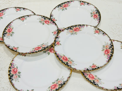 A set of 6 Royal Albert Lunch Plates in the Concerto pattern. &nbsp;Very good condition, would appear unused. &nbsp;White base colour decorated with pink roses and gilded rims.&nbsp;