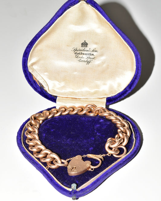 Pulsera antigua de eslabones curb de oro de 9 quilates en caja original con forma de corazón púrpura