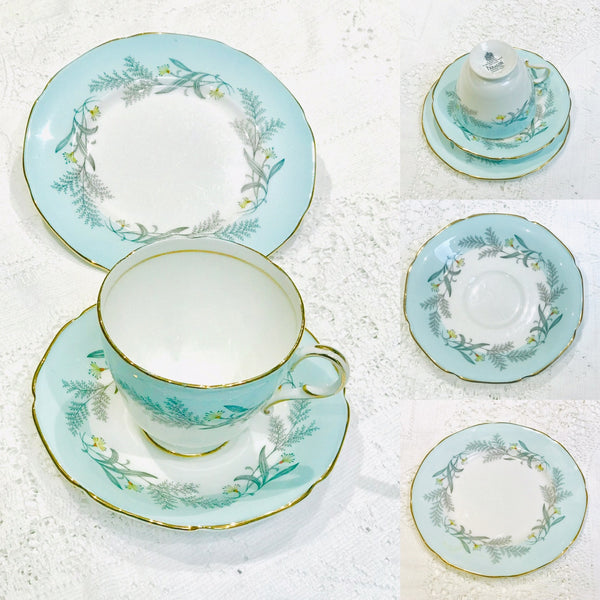 Paragon English fine bone china. Teacups & Saucers for Afternoon Tea.  Very good condition.  Standard size.  White base colour decorated with a baby blue contrast and gold edges.  Wedding/Anniversary Gift.    1 Teacup 1 Sauce 1 Tea plate