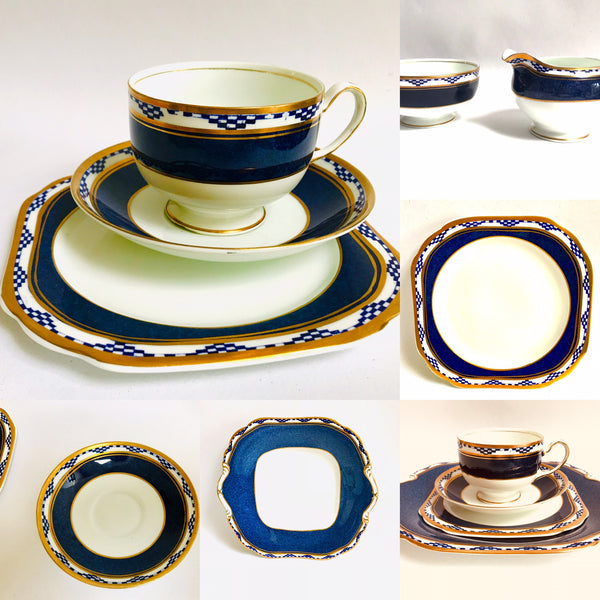 An original Art Deco Tea Set made in England by Anchor China.  Geometric Design with bold blue and contrast white.  Gold Rims.  This is a 21 piece set for 6 people 